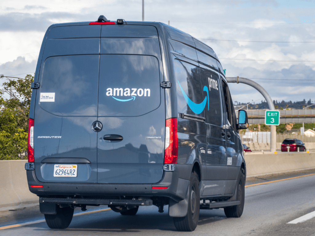 An Amazon van on the freeway.