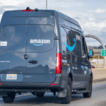 An Amazon van on the freeway.